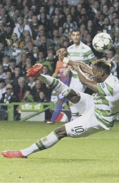  ??  ?? 0 Moussa Dembele scores his second goal – Celtic’s third – with a superb overhead kick 28 seconds into the second half after Kieran Tierney’s cross had been missed by Aleksandar Kolarov.