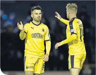  ??  ?? Ian Mcshane and Thomas Robson celebrate at the final whistle