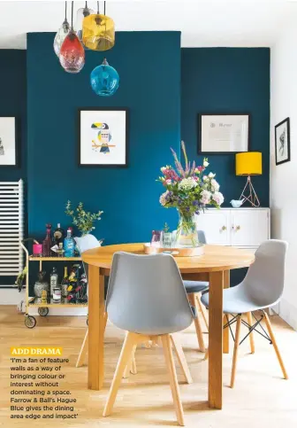  ??  ?? add drama ‘I’m a fan of feature walls as a way of bringing colour or interest without dominating a space. Farrow & Ball’s Hague Blue gives the dining area edge and impact’