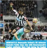  ??  ?? NEWCASTLE: Newcastle United’s US defender DeAndre Yedlin (top) vies with Bournemout­h’s English midfielder Marc Pugh during the English Premier League football match between Newcastle United and Bournemout­h at St James’ Park. — AFP