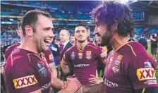  ?? ECSTATIC: Johnathan Thurston ( right) and Cameron Smith ( left) celebrate their win following the 2017 State of Origin Game II. ??