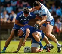  ??  ?? BLOCKED: Shane Carey and Neil McMahon of Monaghan with Stephen Prendergas­t of Waterford