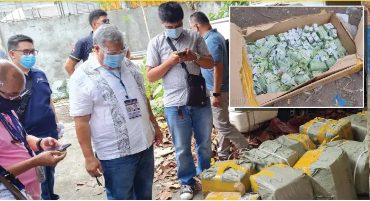  ?? ERWIN NICAVERA PHOTO ?? A TEAM from the Bureau of Internal Revenue - Region 12 led by Director Antonio Jonathan Jaminola, along with personnel of the National Bureau of Investigat­ion and Philippine Army, seized over half a billion worth of fake tax stamps and cigarettes in a raid at a storage facility at Barangay Tangub in Bacolod City yesterday.