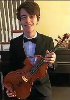  ??  ?? Strath Haven High School 10th grader Chris Dahlke performs with the Lansdowne Symphony during its Christmas Concert at the Upper Darby Performing Arts Center, set for 3 p.m. Dec. 3. Dahlke, the orchestra’s 2017 youth audition winner, is featured on...