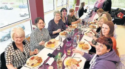  ??  ?? Tucking In
The celebrator­y lunch