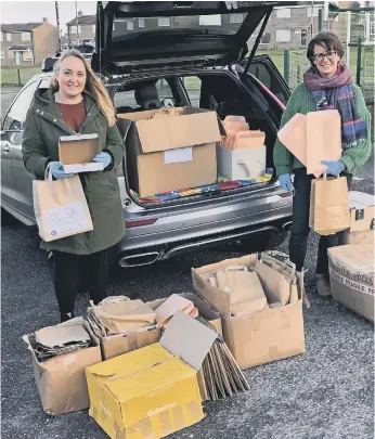  ?? ?? The Cultural Spring’s Emma Horsman, left, with Emma Scarr dropping off craft packs.