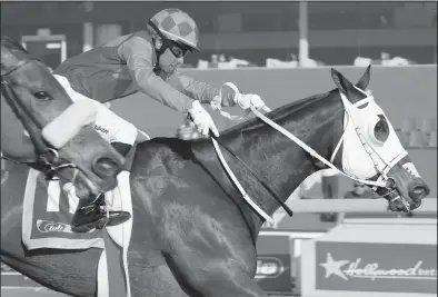  ?? Picture: ?? EFFORTLESS REWARD, with Yuzae Ramzan up, wins the Logan Pillay Architectu­ral Designs Pinnacle Stakes for trainer Louis Goosen at Hollywoodb­ets Scottsvill­e yesterday.