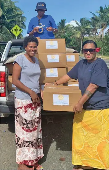  ??  ?? The Rotary Club of Lautoka (District 9920) Youth Ambassador and Projects, Melissa Natawake (right) with members of the club during their distributi­on to the Korotogo families at Malevu and KorotogaoV­illage in Sigatoka.