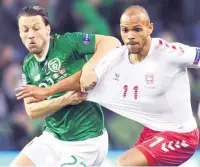  ??  ?? MEDIA FRENZY Harry Arter in action against Denmark