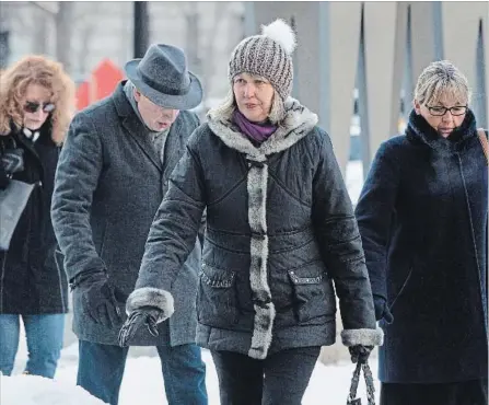  ?? CHRIS YOUNG THE CANADIAN PRESS ?? Linda Babcock, second from right, mother of Laura Babcock, arrives at a Toronto courthouse for the sentencing of Dellen Millard and Mark Smich.