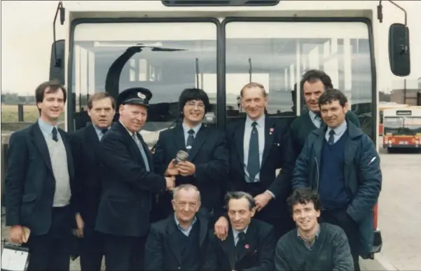  ??  ?? Dundalk bus drivers, mid-shift, in the early 1980s. From left, J. Barry, J. Meehan, M. Hamilton, G. O’Riordan, L. Quinn, L. Tuite, P. Taaffe, senior coach driver. Front, P. Goss, F. Mohan, B. McGuinness.