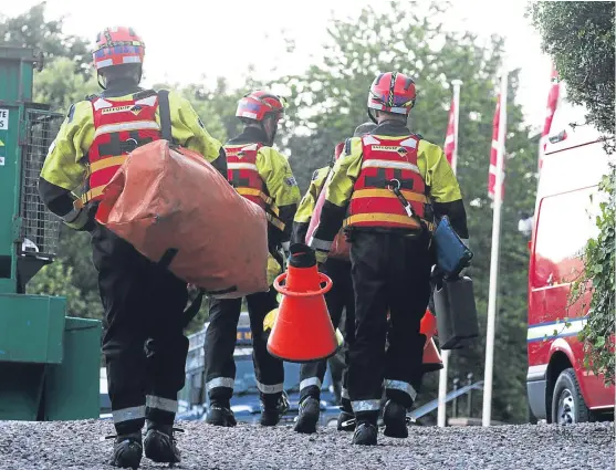  ?? Picture: Mhairi Edwards. ?? Rescue crews at Falls of Bruar where a 19-year-old man’s body was recovered yesterday.