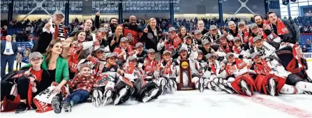  ?? OHIO STATE ATHLETICS ?? Ohio State women's hockey celebrates after a 1-0 win over Wisconsin in the national championsh­ip game.