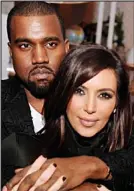  ??  ?? Pregnant: Kim with Kanye West