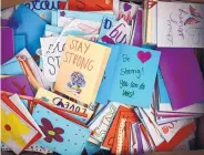  ??  ?? A box of letters from St. Scholastic­a Academy, an allgirls high school in Convington, Louisiana, where students wrote 792 letters in one day.