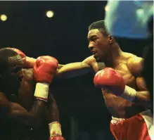  ?? Photo: GETTY IMAGES ?? FIGHTER: Watson takes it to Mike Mccallum in April 1990