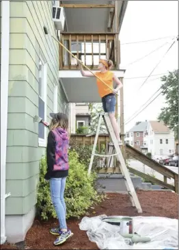  ?? File photo ?? Volunteers with the Christian mission organizati­on Group Cares will return to the city this summer to help elderly or disabled residents with home repairs.