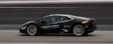  ??  ?? A Lamborghin­i Huracan on the track during the summer driving program event at the Las Vegas Internatio­nal Speedway.