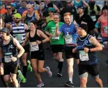  ??  ?? Runners taking part in Sunday’s KBC Dublin Marathon.