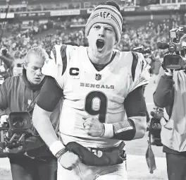  ?? CHRISTOPHE­R HANEWINCKE­L/USA TODAY SPORTS ?? The Bengals’ Joe Burrow, who threw for 348 yards, celebrates after the 19-16 win over the Titans.