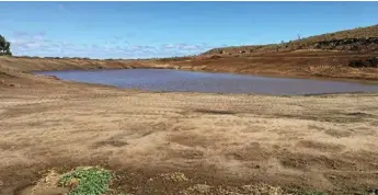  ??  ?? The dam was full after the first 64mm storm on March 15.