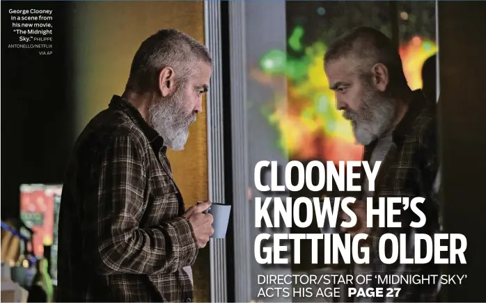  ?? PHILIPPE
ANTONELLO/NETFLIX
VIA AP ?? George Clooney in a scene from his newmovie, “TheMidnigh­t
Sky.”