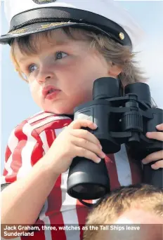  ??  ?? Jack Graham, three, watches as the Tall Ships leave Sunderland