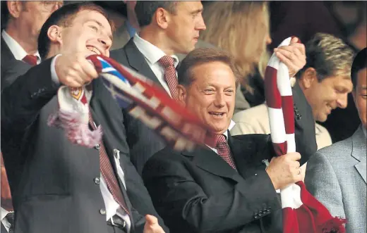  ??  ?? VLADIMIR ROMANOV: The Lithuanian tycoon watched Hearts play Hibs in 2005 at Tynecastle after buying a stake in the club, saying it was a ‘very good investment’.