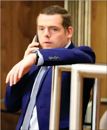  ?? Picture: Peter Jolly ?? A sombre-looking Douglas Ross at Moray council’s election count yesterday. The Scottish Conservati­ve leader blamed Partygate for the loss of 63 council seats, which resulted in Labour overtaking the Tories in Scotland