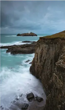  ??  ?? Above GODREVY LIGHTHOUSE, CORNWALL Here David used portrait orientatio­n to create depth between the lighthouse and foreground elements