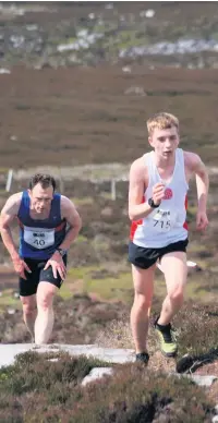  ??  ?? Emily Morgan, left and Charlie Taylor, right, of Rossendale Harriers competing for Lancashire