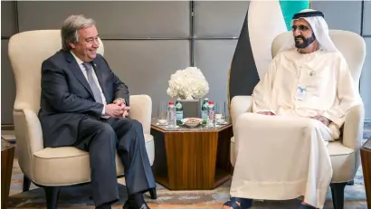  ?? — Wam ?? His Highness Sheikh Mohammed bin Rashid Al Maktoum, Vice-President and Prime Minister of the UAE and Ruler of Dubai, with UN Secretary General Antonio Guterres, who spoke on globalisat­ion and government institutio­ns, at Day 2 of the summit.