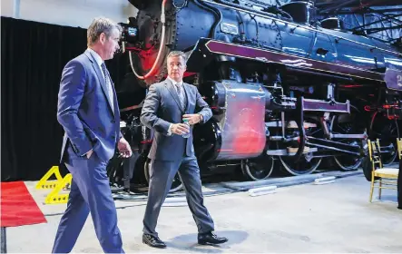  ?? JEFF McINTOSH/CP FILES ?? Canadian Pacific Railway CEO Keith Creel, right, expects more crude to be shipped by train amid the current pipeline crunch.