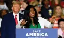  ?? Photograph: Todd McInturf/AP ?? Donald Trump listens as Kristina Karamo speaks during a rally in Warren, Michigan, in 2022.