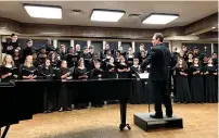  ?? Submitted photo ?? ■ Marc-André Bougie conducts local choirs during Yulefest,, an annual celebratio­n of the sounds of Christmas presented at Texarkana College.