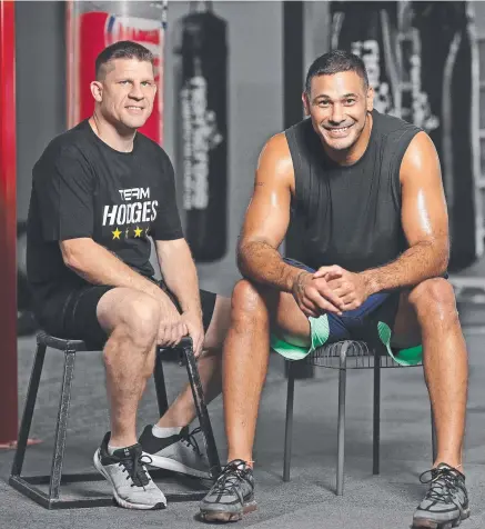  ?? Picture: PETER WALLIS ?? DEBUT READY: Justin Hodges ( right) with his trainer Gareth Williams.