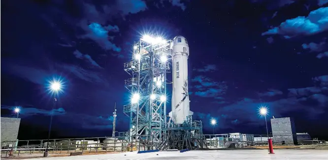  ?? BLUE ORIGIN/ REUTERS-29/4/2018 ?? ‘Rocket man’. O foguete New Shepard tem o seu primeiro voo tripulado marcado para terça-feira; odisseia espacial levará apenas 11 minutos e pode colocar empresa na disputa do setor