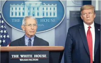  ??  ?? US President Donald Trump and National Institute of Allergy and Infectious Diseases director Dr Anthony Fauci, who answers a question during the daily coronaviru­s task force briefing at the White House, in Washington, on April 17. | Reuters