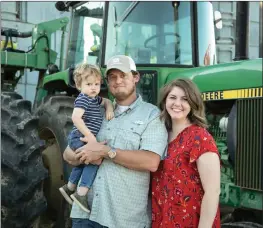  ?? SUBMITTED ?? The Brad Peacock family of Bald Knob is the East Central District Farm Family of the Year. They competed as the White County Farm Family of the Year and were selected as one of eight district winners, who will now compete for the state title. The family includes Brad and Tara Peacock and their 1-year-old son, Silas. The couple grow soybeans and rice, along with corn, on 1,000 acres of leased land in White County.