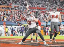  ?? Ben Liebenberg The Associated Press ?? Rob Gronkowski celebrates one of his two touchdown receptions in the Buccaneers’ 31-9 win against the Chief in the Super Bowl.