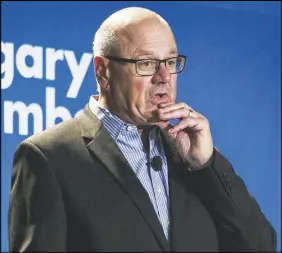  ?? CP PHoTo ?? Calgary Flames president and CEO Ken King speaks to the business community at a Calgary Chamber of Commerce luncheon regarding the future of the NHL team.