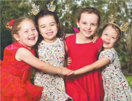  ?? SING STARS: Lucille Higgins, Zara Boldery, Olivia Rolley and Amelie Colleton, all aged 4, get ready for the carols. Picture: SHAE BEPLATE ??