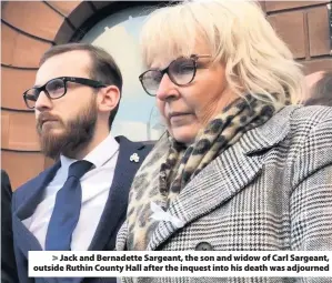  ??  ?? &gt; Jack and Bernadette Sargeant, the son and widow of Carl Sargeant, outside Ruthin County Hall after the inquest into his death was adjourned