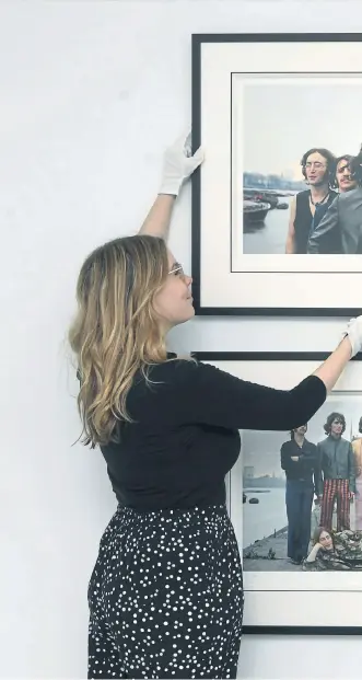  ?? ?? WITH THE BEATLES: Above, Redhouse Originals gallery manager Emily Merriott and director Richard McTague arrange images by Tom Murray from The Beatles: Mad
Day Out photograph­y exhibition. Top left, The Beatles in an unguarded moment. Right, photograph­er Tom Murray.