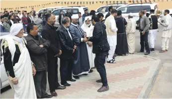  ?? AFP ?? Libyan tribal leaders at a gathering in Zintan, 170 kilometres south-west of Tripoli, in March this year. No one in the town is willing to give a clear answer on the whereabout­s of Saif Al Islam