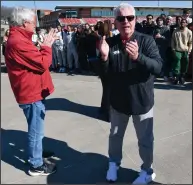  ?? (NWA Democrat-Gazette/Andy Shupe) ?? Arkansas men’s track and field Coach Chris Bucknam (right) and the Razorback men’s and women’s teams will host the Tyson Invitation­al beginning today at the Randal Tyson Center in Fayettevil­le.