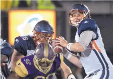  ?? PHELAN M. EBENHACK/ASSOCIATED PRESS ?? Orlando quarterbac­k Garrett Gilbert, right, sets up to throw during his team’s rout of Atlanta as the AAF made its debut.