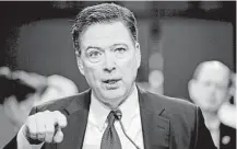  ?? Andrew Harnik / Associated Press ?? Former FBI Director James Comey paints a devastatin­g portrait of President Donald Trump in his new memoir.