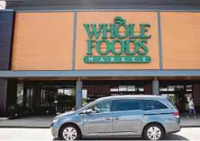  ?? BLOOMBERG PIC ?? Amazon.com is looking to acquire Whole Foods Market Inc.