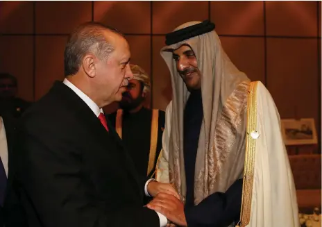  ?? AP ?? Turkish president Recep Tayyip Erdogan, left, welcomes Qatari emir Sheikh Tamim before the opening session yesterday of the Organisati­on of Islamic Co-operation Extraordin­ary Summit in Istanbul. Gen H R McMaster, below